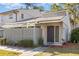 Charming single-story home featuring a fenced yard and inviting entryway at 5753 Summer Side Ln # 8A, Sarasota, FL 34231