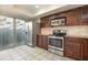 Updated kitchen with stainless steel appliances and granite countertops at 5753 Summer Side Ln # 8A, Sarasota, FL 34231