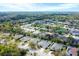 Aerial view of neighborhood with mature trees, lakes and a variety of single Gathering homes at 5806 43Rd E Ct, Bradenton, FL 34203