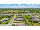 Overhead image showcasing a home in a community, abundant greenery, and well-maintained landscaping at 604 166Th E St, Bradenton, FL 34212
