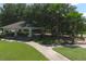 Picturesque park pavilion with seating, set amidst lush greenery and mature trees, offering a serene retreat at 604 166Th E St, Bradenton, FL 34212