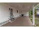 Covered carport features ample space, with a tidy exterior and well-maintained surroundings at 617 Cervina S Dr, Venice, FL 34285