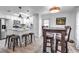 Bright dining area featuring a modern design and adjacent to a beautifully designed kitchen at 617 Cervina S Dr, Venice, FL 34285