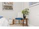 Stylized bedroom with accent chair and decorative plant at 7137 Bougenville Dr, Port Richey, FL 34668