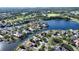 Aerial view showcases this waterfront home with golf course views at 7340 Barclay Ct, University Park, FL 34201