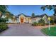 Beautiful home featuring a brick driveway, well-manicured landscaping and an attached two-car garage at 7340 Barclay Ct, University Park, FL 34201