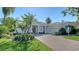 Stunning home with lush landscaping, paver driveway and side-entry garage at 7340 Barclay Ct, University Park, FL 34201