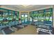 Bright fitness center featuring treadmills, weight machines, benches, and floor to ceiling windows at 7340 Barclay Ct, University Park, FL 34201
