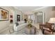 Inviting living room with tile floors, neutral tones, and a seamless transition to other living spaces at 7340 Barclay Ct, University Park, FL 34201