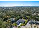 Aerial view of a beautiful house showing the pool and landscape at 749 Tropical Cir, Sarasota, FL 34242