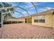 Beautiful outdoor patio with a lovely brick surface, ideal for enjoying sunny days and fresh air at 7655 Pesaro Dr, Sarasota, FL 34238