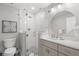 Modern bathroom featuring a glass-enclosed shower, elegant fixtures, and stylish tile flooring, showcasing a clean design at 785 Jacaranda Rd, Anna Maria, FL 34216