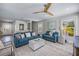 A spacious living room with bright and light colors, coastal decor, and an open floor plan at 785 Jacaranda Rd, Anna Maria, FL 34216