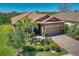 Charming single-Gathering home with a landscaped front yard and brick-paved driveway at 8168 36Th E St, Sarasota, FL 34243