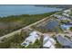 Beautiful homeside with a tranquil pond, lush greenery, and a calm residential street at 8227 37Th Avenue W Cir, Bradenton, FL 34209