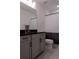 Bathroom featuring vanity with black countertops and a shower with a curtain at 8521 Canyon Creek Trl, Parrish, FL 34219