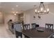 View of the kitchen island and living area at 8521 Canyon Creek Trl, Parrish, FL 34219