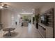 The open-concept living room connects seamlessly to the kitchen with recessed lighting at 8521 Canyon Creek Trl, Parrish, FL 34219