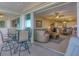 Inviting balcony with comfortable seating, offering a seamless transition to indoor living at 9203 Griggs Rd # A302, Englewood, FL 34224