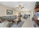 Open-concept living space seamlessly connects to a dining area and kitchen for easy living and entertaining at 9203 Griggs Rd # A302, Englewood, FL 34224
