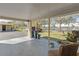 Covered carport area offering shaded parking and storage space, blending seamlessly with the home's exterior at 94 Strathmore Blvd, Sarasota, FL 34233