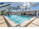 The community pool features clear blue water and plenty of room for swimming at 94 Strathmore Blvd, Sarasota, FL 34233