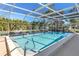 The community pool features clear blue water and plenty of room for swimming at 94 Strathmore Blvd, Sarasota, FL 34233