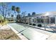 Enjoy a friendly game of shuffleboard next to the pool in this active community at 94 Strathmore Blvd, Sarasota, FL 34233