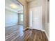 Inviting home foyer features wood-look flooring and views into the main living space at 10006 Degas Ter, Bradenton, FL 34212