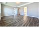 Spacious main bedroom with modern floors and neutral paint ready for you to move in at 10006 Degas Ter, Bradenton, FL 34212