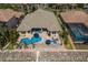 Aerial shot of beautiful backyard with a pool, patio, and direct water access at 1009 3Rd E St, Palmetto, FL 34221