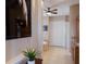 Hallway view into bathroom featuring a tub, shower, and vanity at 1009 3Rd E St, Palmetto, FL 34221