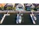 Aerial view of a private boat dock with boat lift, providing direct water access at 1009 3Rd E St, Palmetto, FL 34221