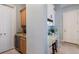 Functional hallway with cabinet space and a wine fridge at 1009 3Rd E St, Palmetto, FL 34221