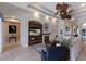 Cozy living room with a fireplace and entertainment center for entertainment and relaxation at 1009 3Rd E St, Palmetto, FL 34221