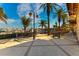 Outdoor dining area with palm trees, overlooking boats docked in the harbor, offering picturesque waterfront views at 1009 3Rd E St, Palmetto, FL 34221