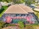 Lovely aerial perspective of the property highlighting a screened-in pool and surrounding mature landscaping at 107 Wayforest Dr, Venice, FL 34292