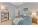 Light filled bedroom with matching end tables and lamps at 107 Wayforest Dr, Venice, FL 34292