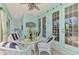 Dining area with patio views and seating for 4 at 107 Wayforest Dr, Venice, FL 34292