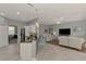 Open floor plan combines the kitchen and living room, offering ample space for entertaining and relaxation at 107 Wayforest Dr, Venice, FL 34292