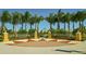 Central Park entrance showcasing decorative landscaping, seating, and brick-paved areas at 11111 Encanto Ter, Bradenton, FL 34211