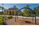 Community playground featuring a covered picnic area and a fun-filled swing at 11111 Encanto Ter, Bradenton, FL 34211