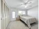 Inviting bedroom with closet, carpet and ceiling fan for a bright and airy feel at 11251 80Th Ave # 305, Seminole, FL 33772
