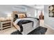 Comfortable bedroom featuring a large bed and windows offering plenty of natural light at 11835 Hollyhock Dr, Lakewood Ranch, FL 34202