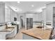Bright kitchen features granite countertops, white cabinetry, and stainless steel appliances at 11835 Hollyhock Dr, Lakewood Ranch, FL 34202