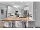 Bright kitchen featuring an island with granite countertops and seating at 11835 Hollyhock Dr, Lakewood Ranch, FL 34202