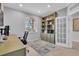 Bright home office with built-in shelves, a window, and ample workspace, perfect for productivity at 11835 Hollyhock Dr, Lakewood Ranch, FL 34202