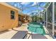 Relaxing pool area with sun loungers and lush landscaping at 11835 Hollyhock Dr, Lakewood Ranch, FL 34202