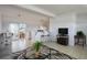 Cozy living room featuring modern decor, dining area, and bar seating, perfect for entertaining guests at 125 Palmetto Ne Cir, Port Charlotte, FL 33952