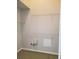 Spacious walk-in closet with adjustable shelving units and a carpeted floor at 13338 Evening Sunset Ln, Riverview, FL 33579